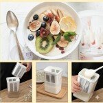 Click to see full view Transparent rectangular yogurt strainer with white lid and inner mesh filter insert, shown on a